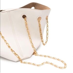 Nanushka micro bag in off white